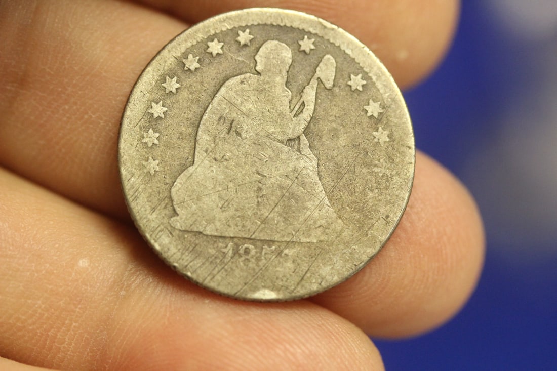 1857 Seated Quarter: as shown