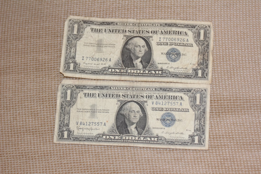 Lot of 2 1957 Blue Seal One Dollar: silver certificate note