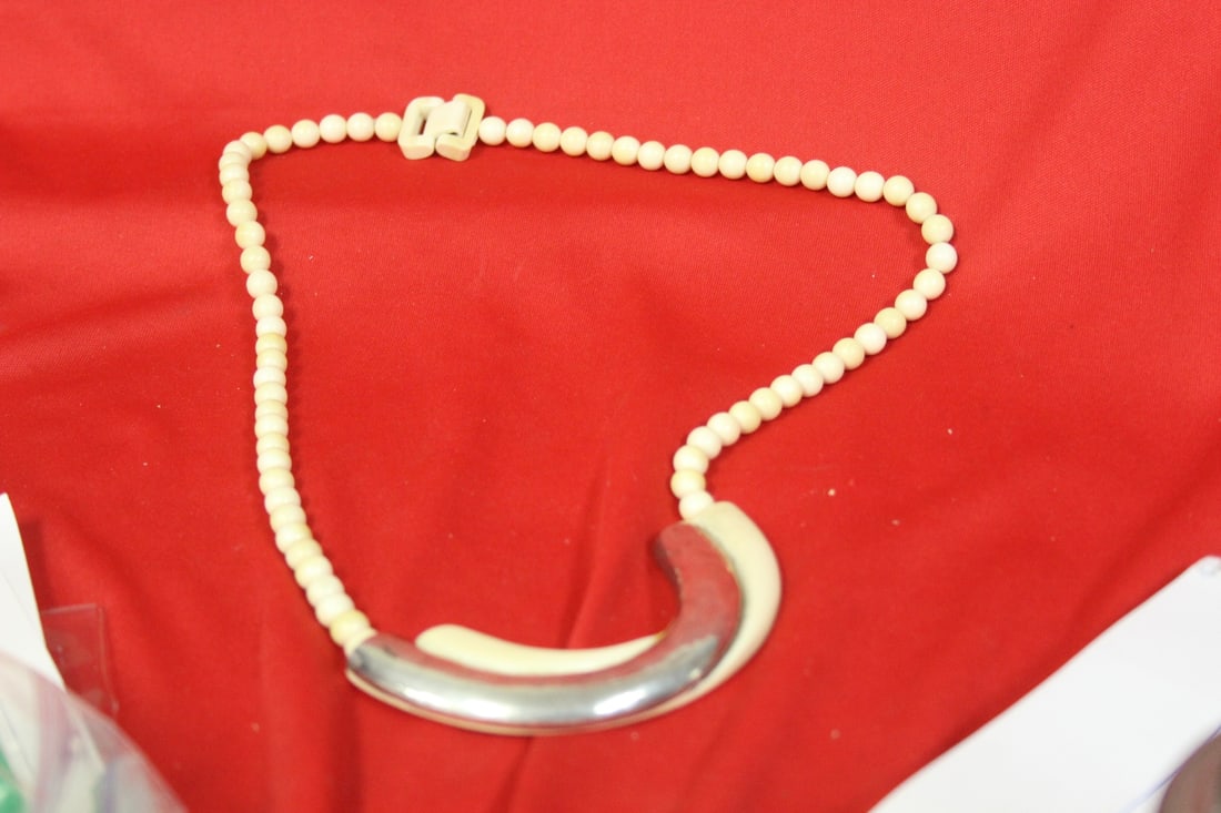 A Bone and Sterling Necklace: as shown
