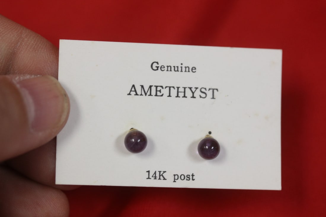 A 14Kt Gold and Amethyst Posted Earrings: as shown