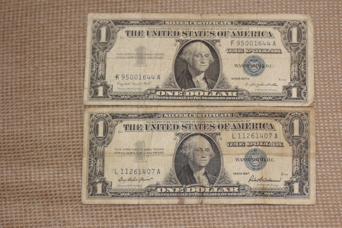 Lot of 2 1957 Blue Seal One Dollar: silver certificate note