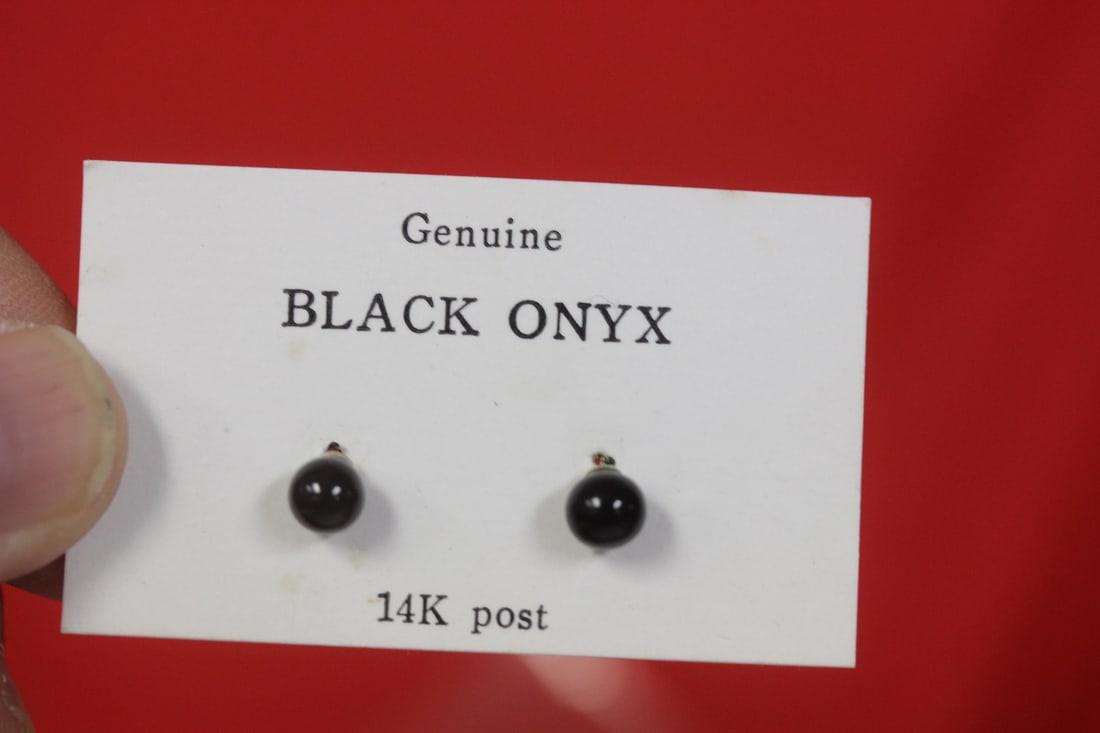 A 14Kt Gold and Onyx Posted Earrings: as shown