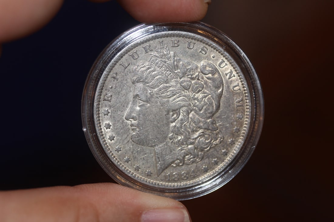 1884 Morgan Silver Dollar: as shown on photos