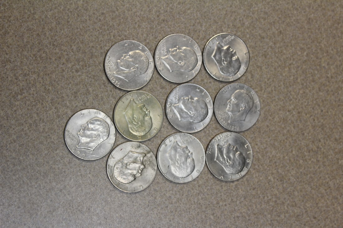 Lot of 10 Clad Ike dollars: as shown