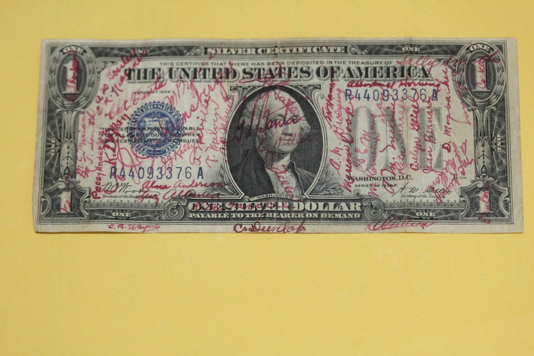 A 1928 One Dollar Funny Back Note: signatures are by the city employees/ officials