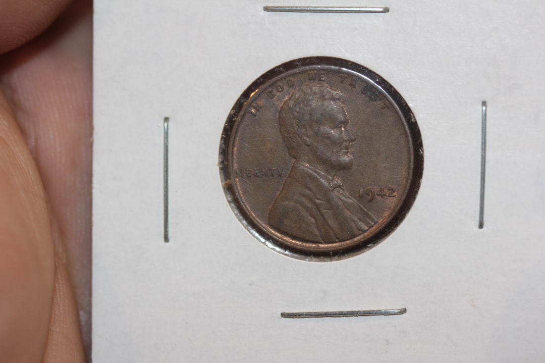 Mint Error 1942 Lincoln Wheat Cent: the "I" appeared to be double struck on the upper tip - rare