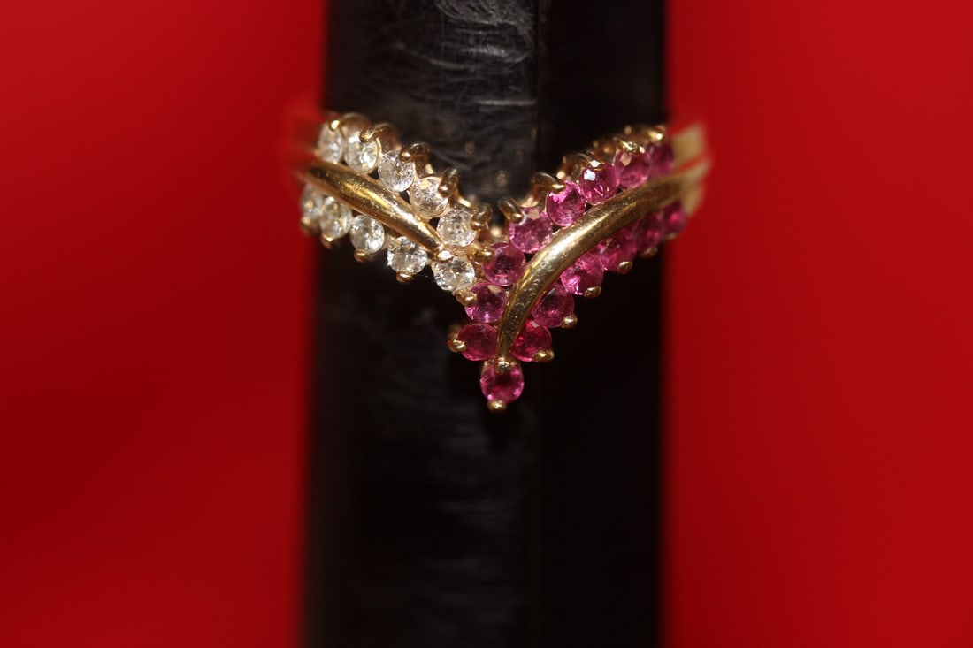 A 14 Karat Gold Ruby and Diamond Ring: as shown