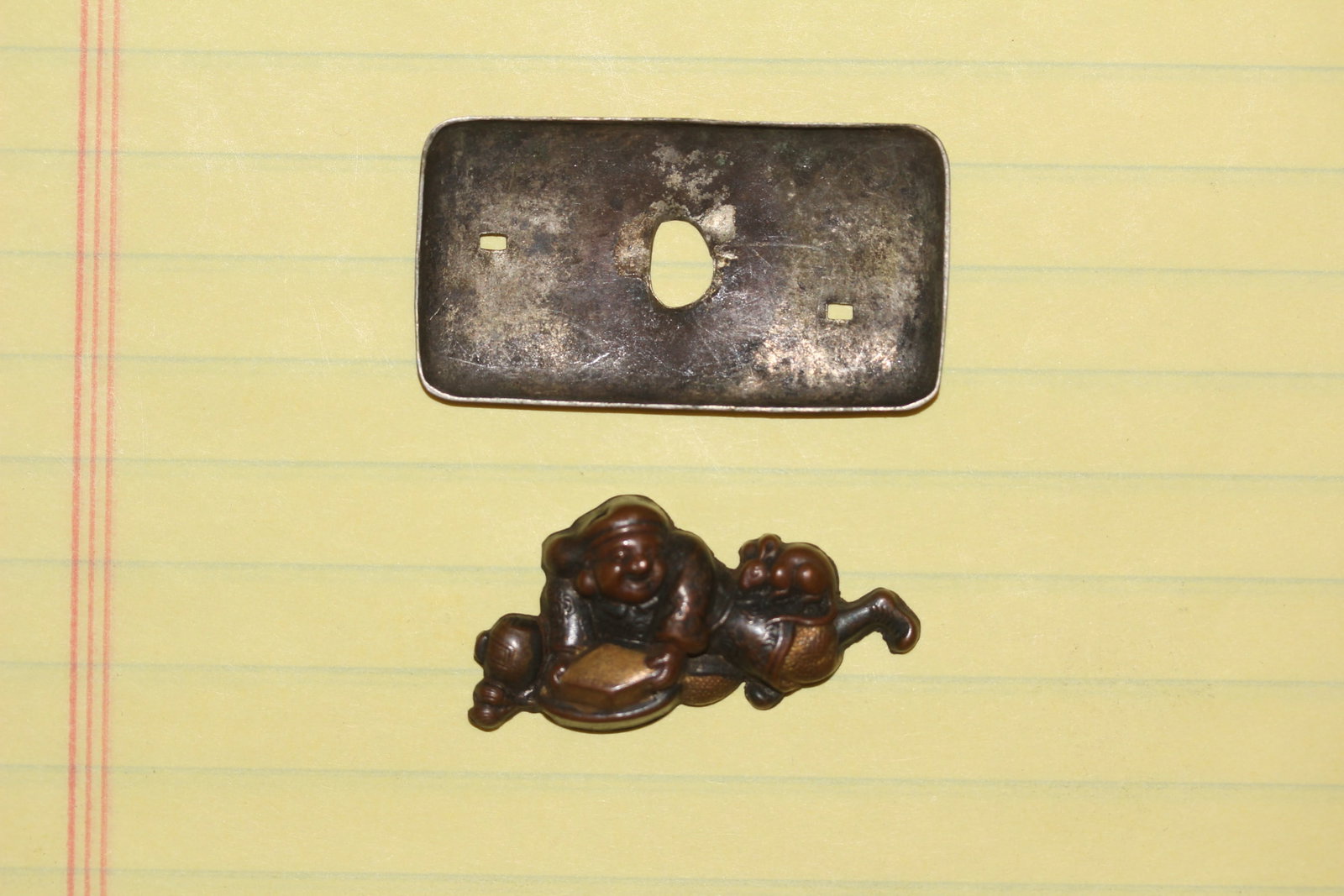A Japanese Menuki: 19th century - most likely Edo period - mixed metal