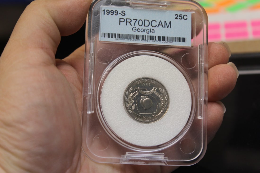 A Grade PR70 DCAM 1999-S Quarter: as shown
