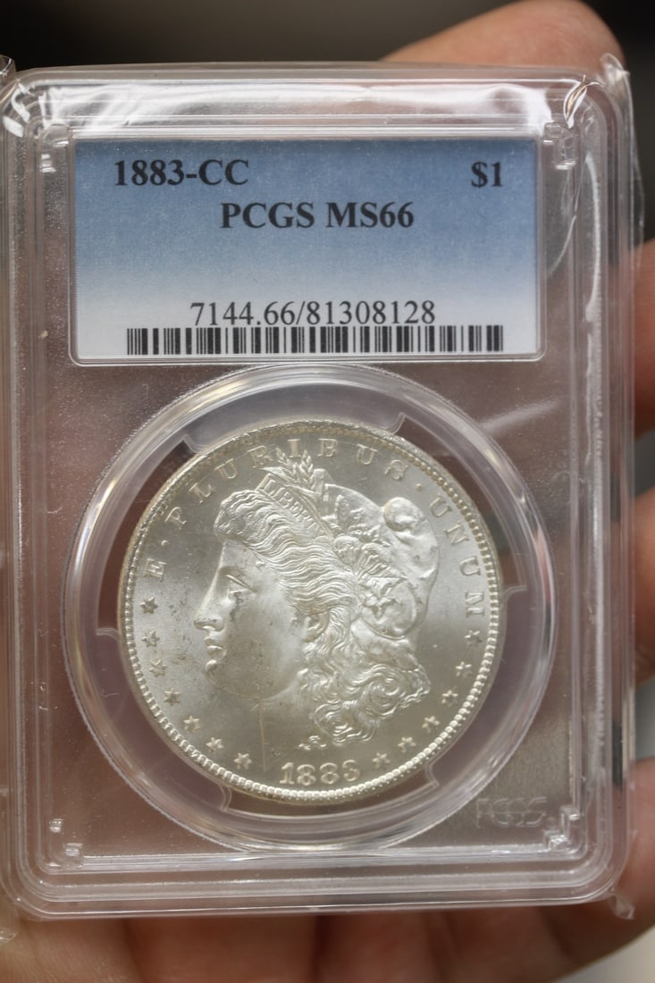 PCGS Graded 1883-CC Morgan Silver Dollar: extremely rare - MS66 - high value coin due to it's grading