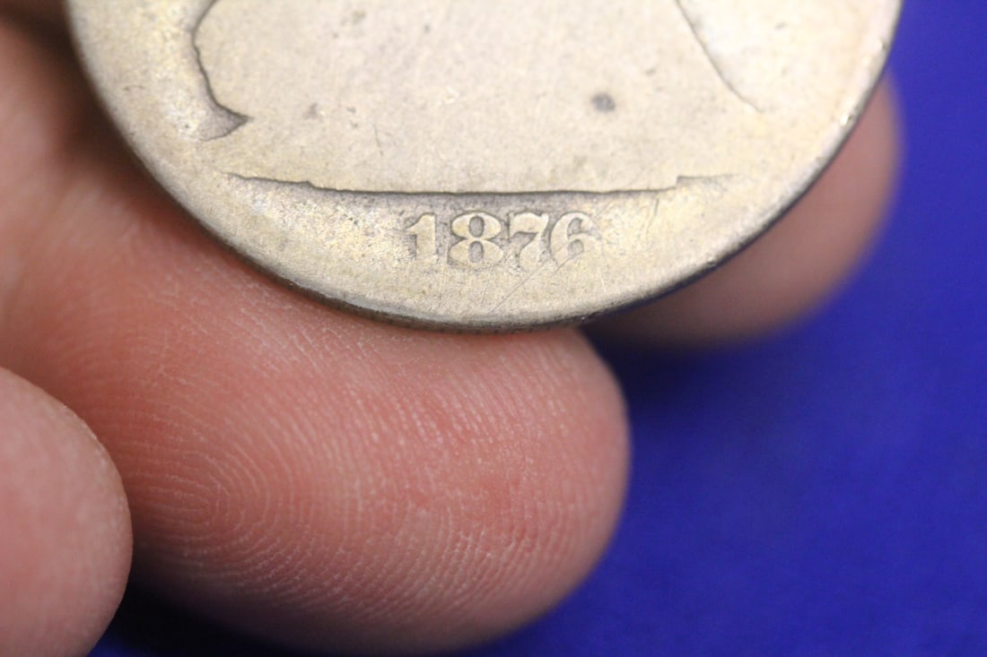 An 1876 Seated Half Dollar - 2