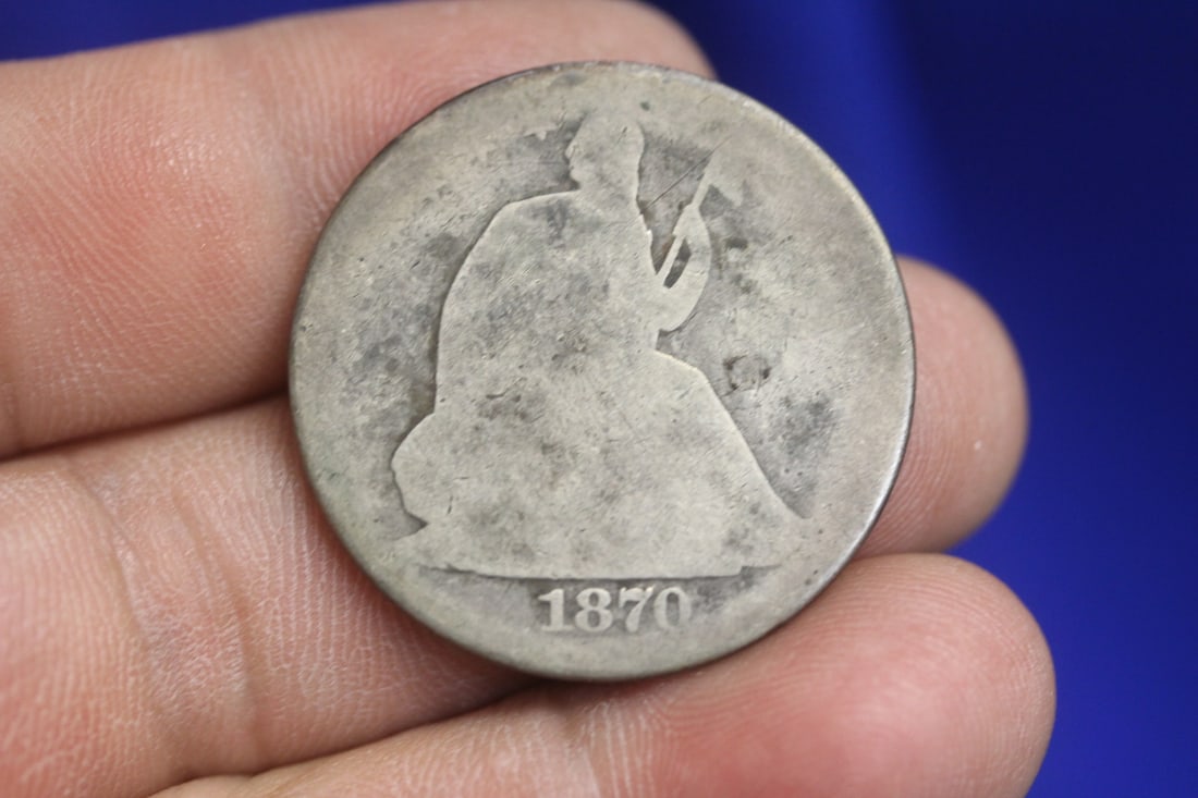 An 1870 Seated Half Dollar (1 of 2)