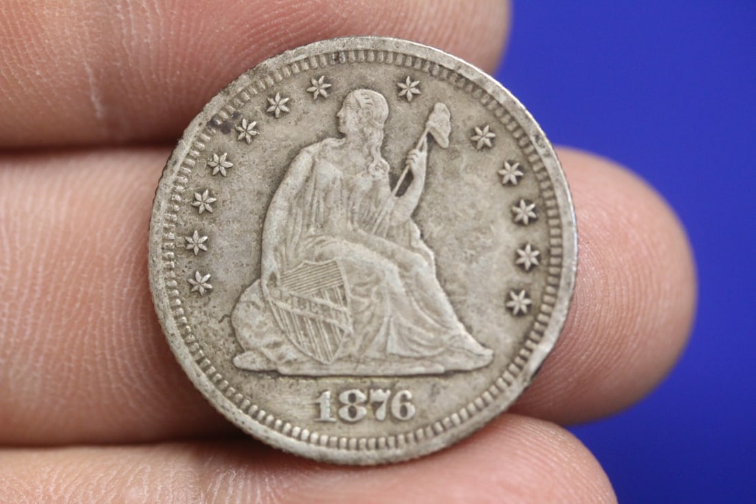 An 1876-S Seated Quarter: very nice looking coin