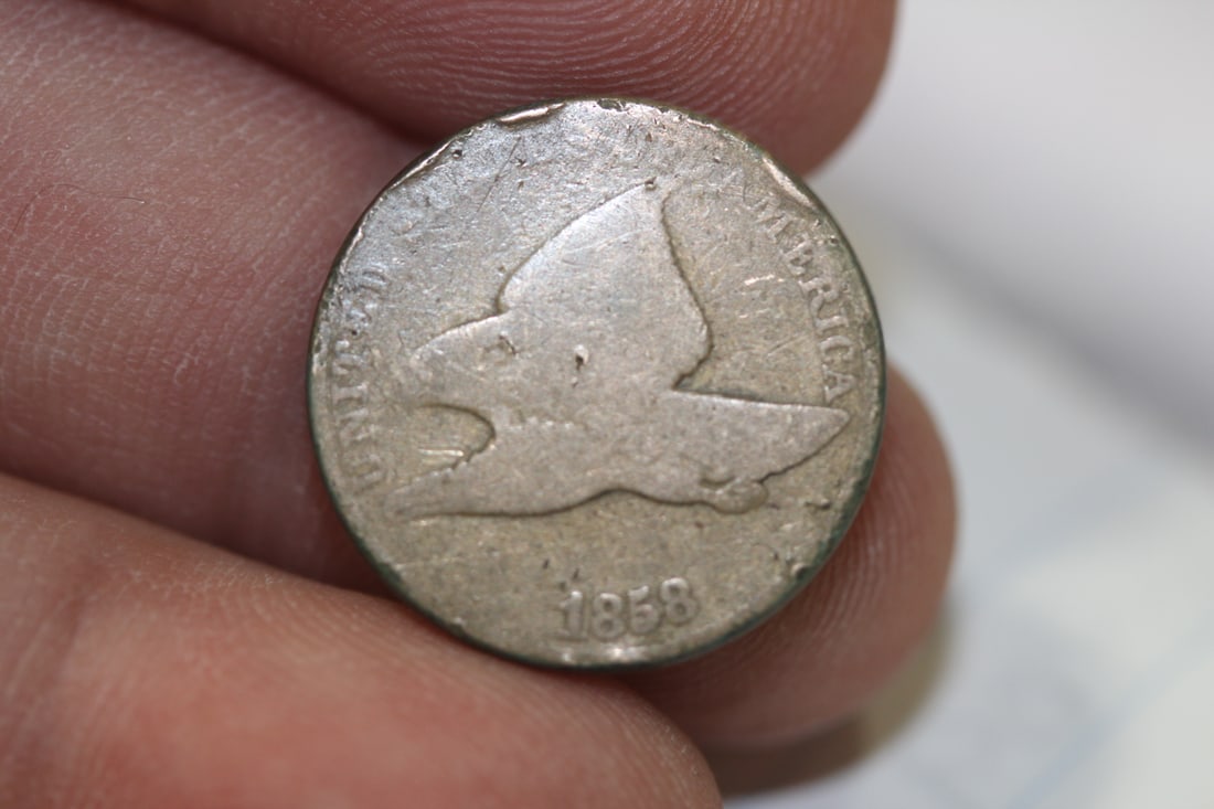 An 1858 Flying Eagle Cent: as shown