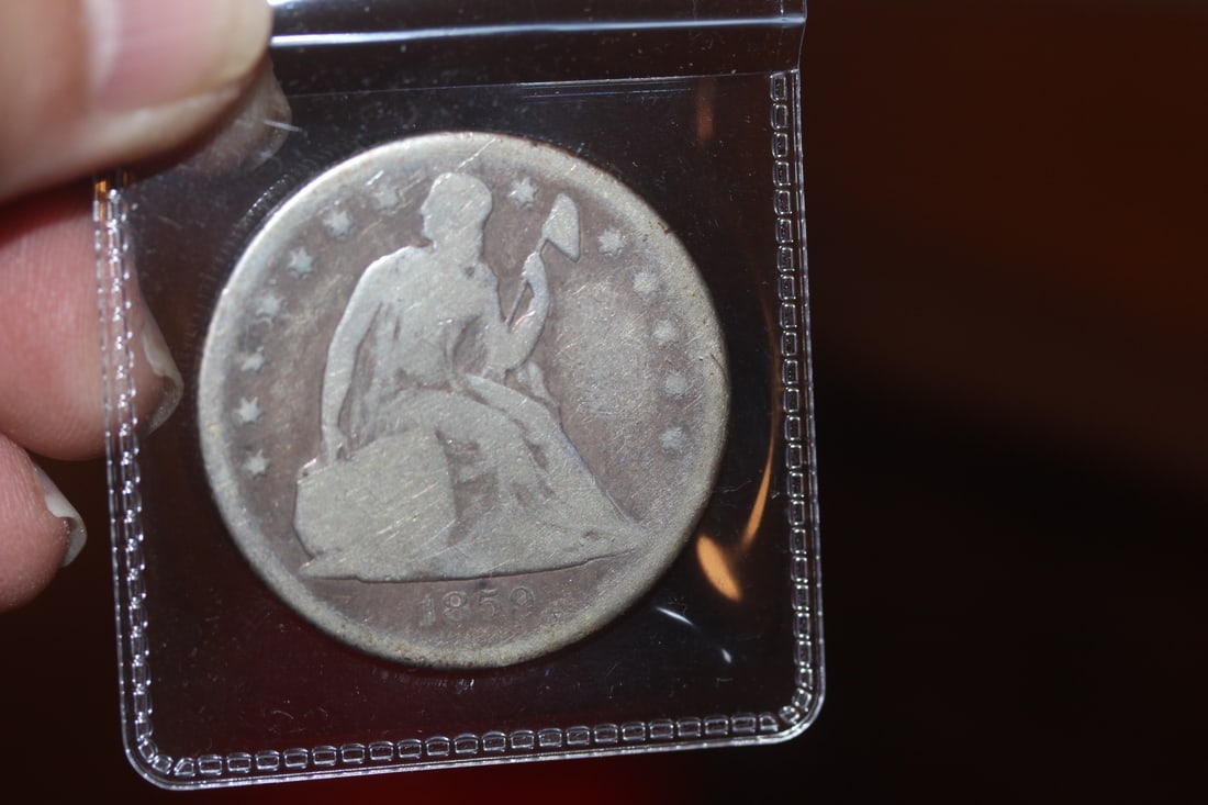 1889-O Seated Liberty Silver Dollar: as shown on photos