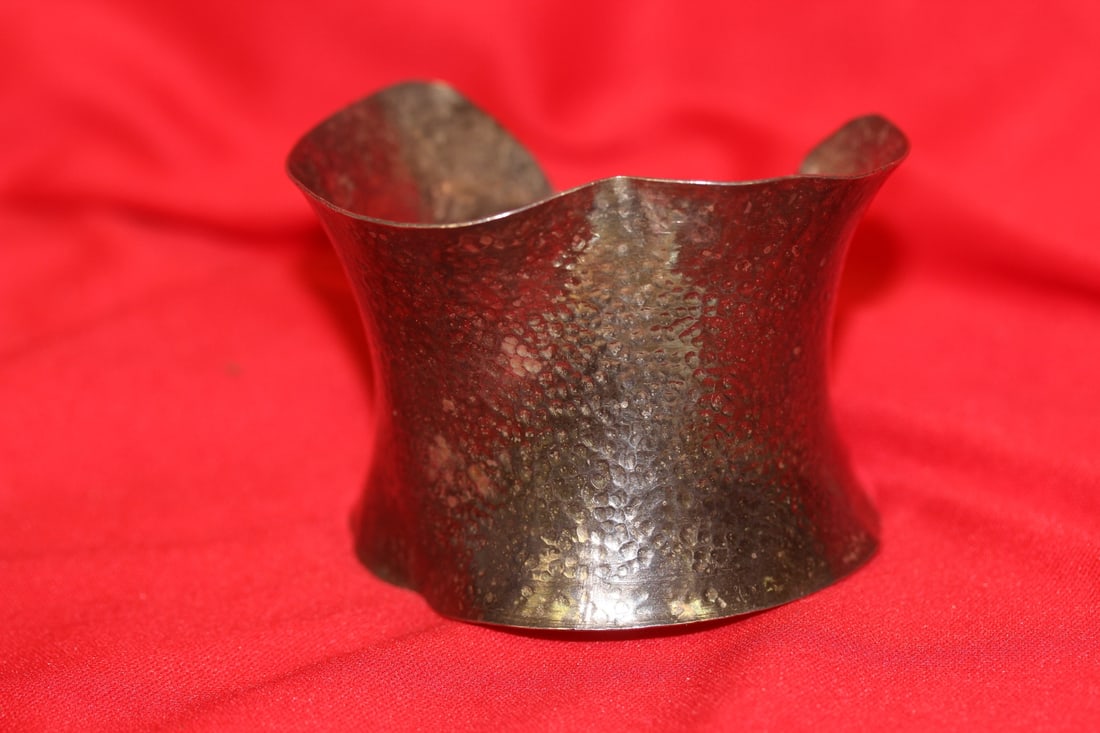 A Sterling Bracelet: 1 7/8" wide (height)