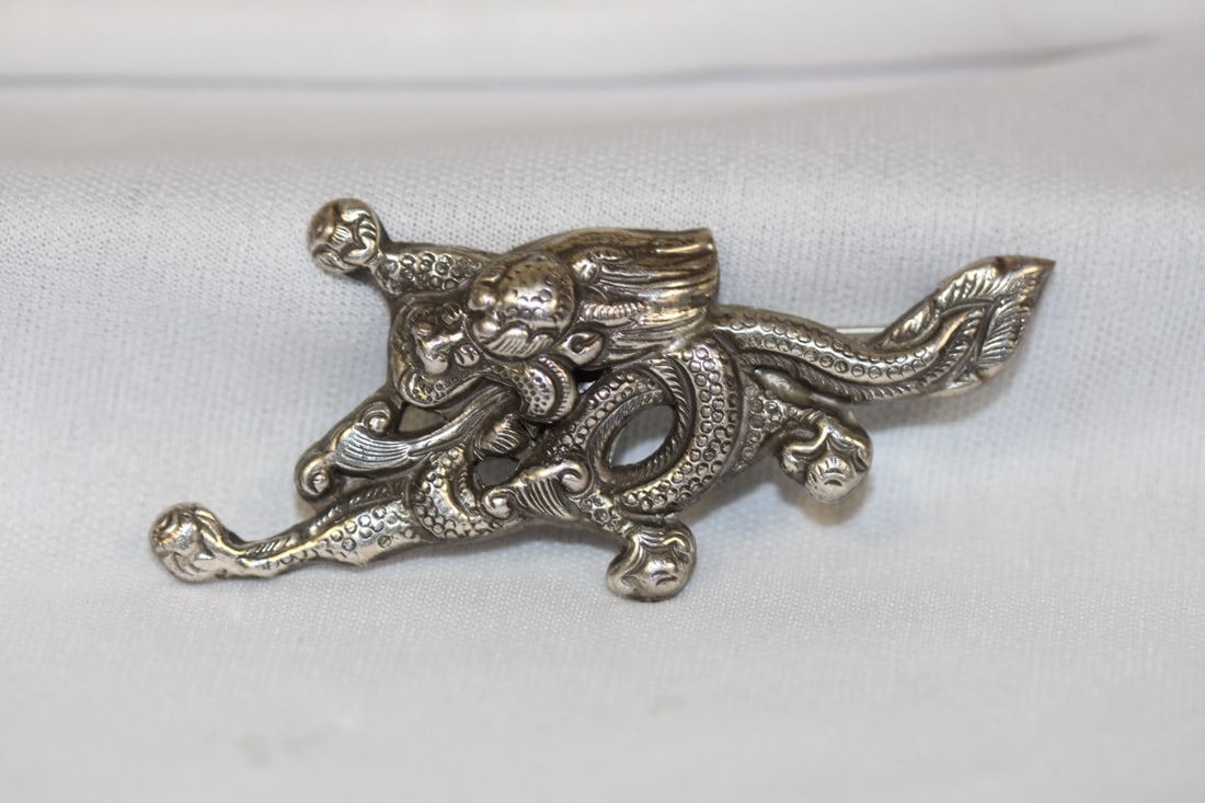 A Chinese/Asian Sterling Brooch: as shown