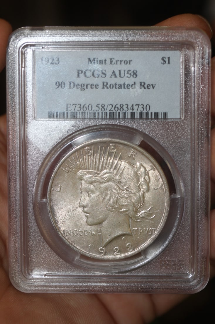 PCGS Graded 1923 Mint Error Peace Dollar: very rare - PCGS graded AU58 - 90 degree rotated reverse