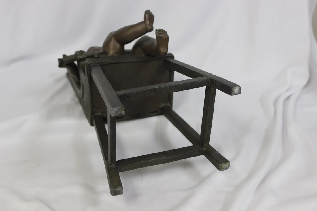 A Bronze Child on a High Chair by Steiner - 10