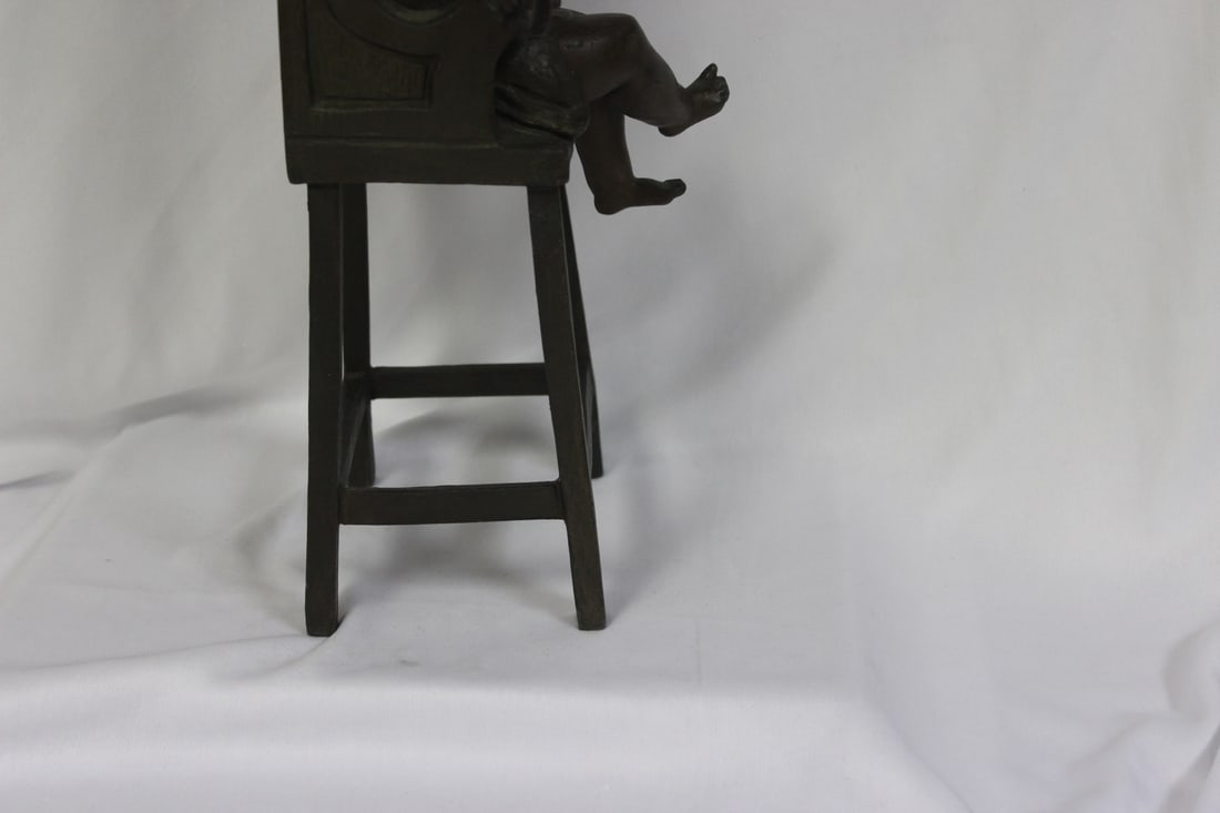 A Bronze Child on a High Chair by Steiner - 6