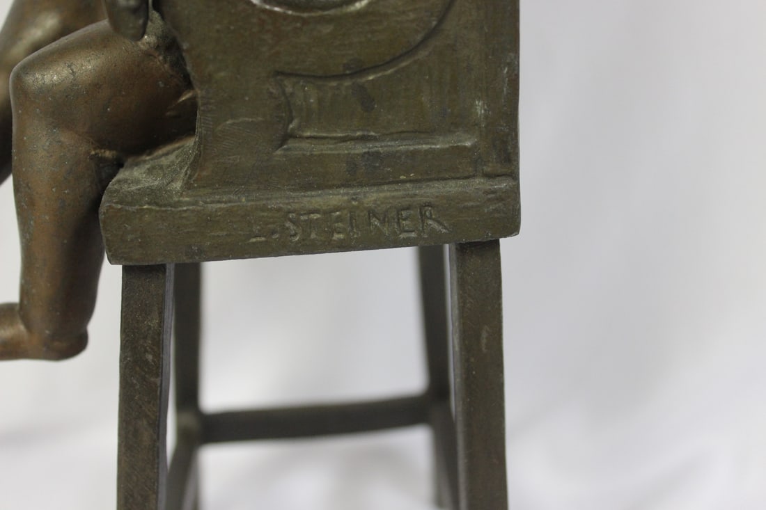 A Bronze Child on a High Chair by Steiner - 9