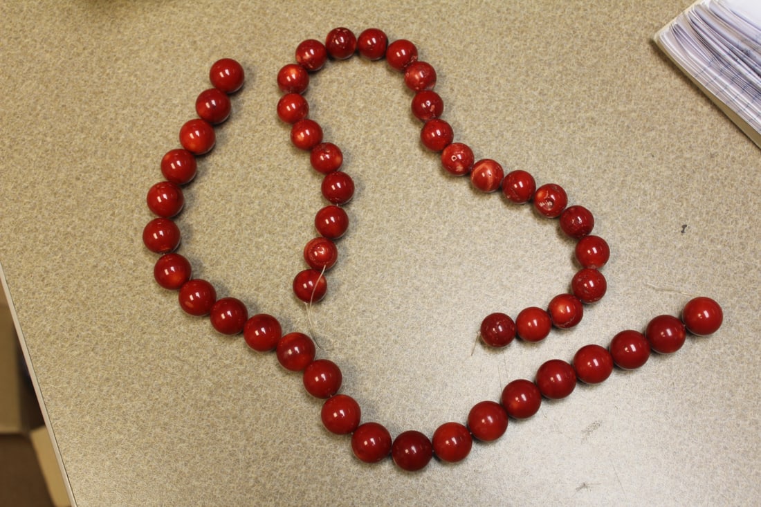 Lot of 2 Strands of Coral: each 17" long - larger bead is about 2cm in diameter