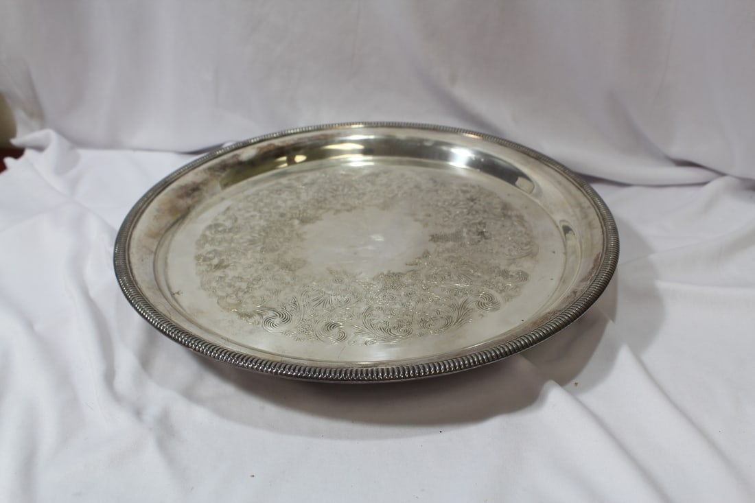 A Silverplated Tray: 12 1/4" in diameter