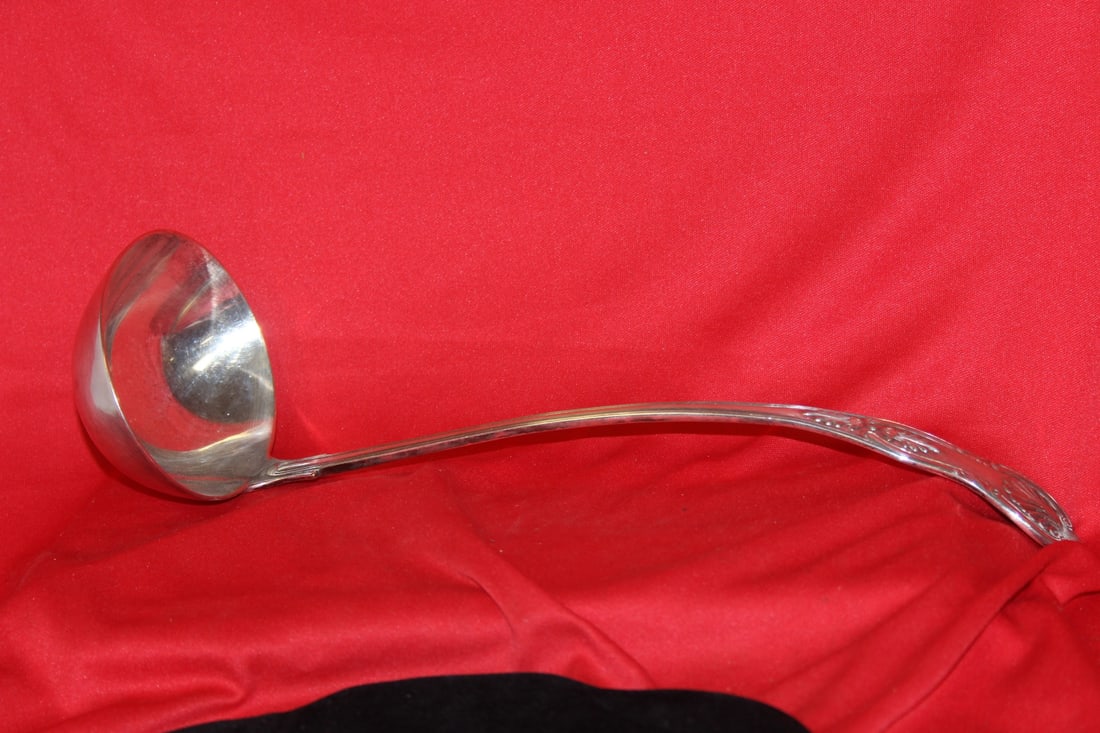 An English Silverplated Ladle: Marked - most likely from the 19th century - 12 1/4" long