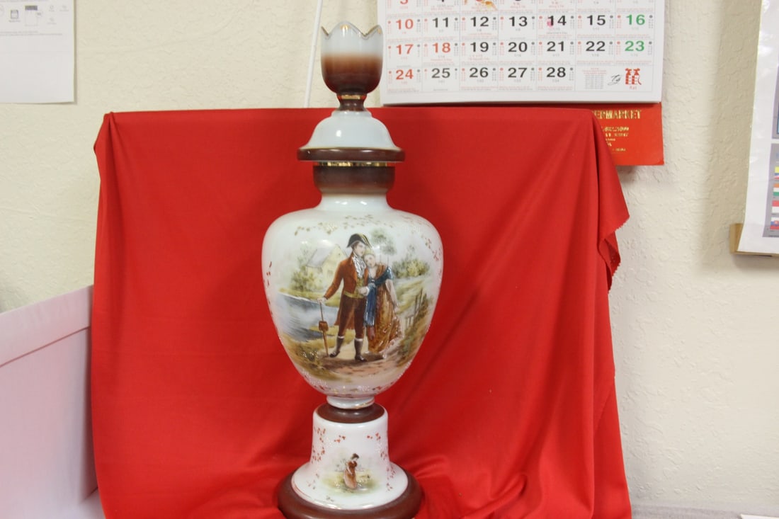 A Hand Painted Glass Vase: 21 inches tall