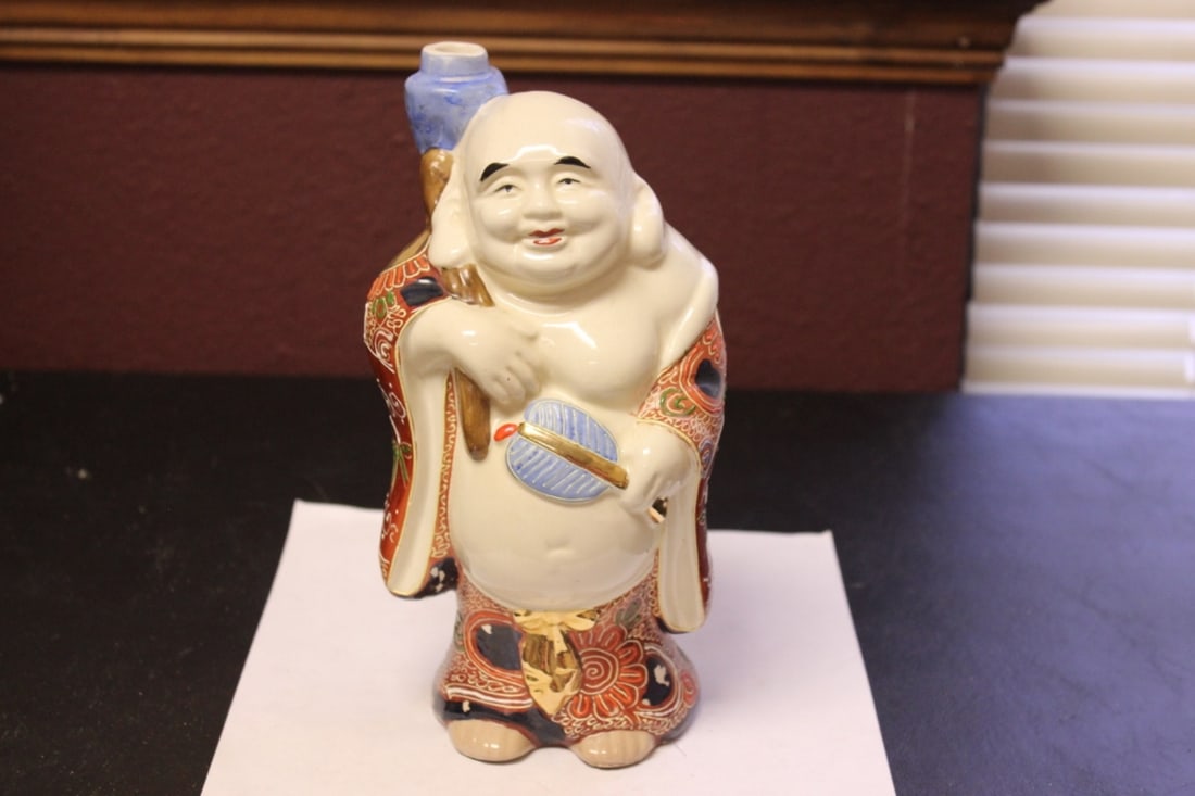 A Vintage Japanese Saki Figeral Bottle: No spirit inside - 8 3/4" tall