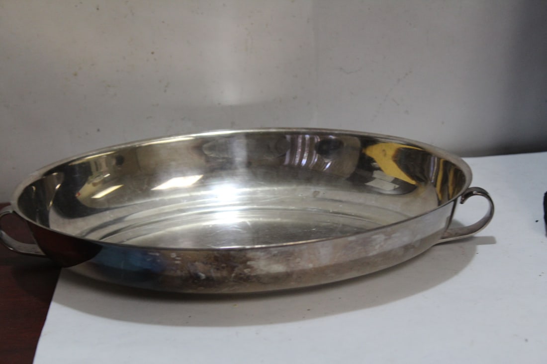 A Silverplated Bowl: with two handles - 9 1/4" across