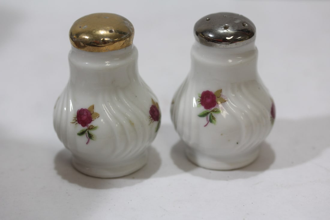 A Pair of Salt and Pepper Shakers - 2