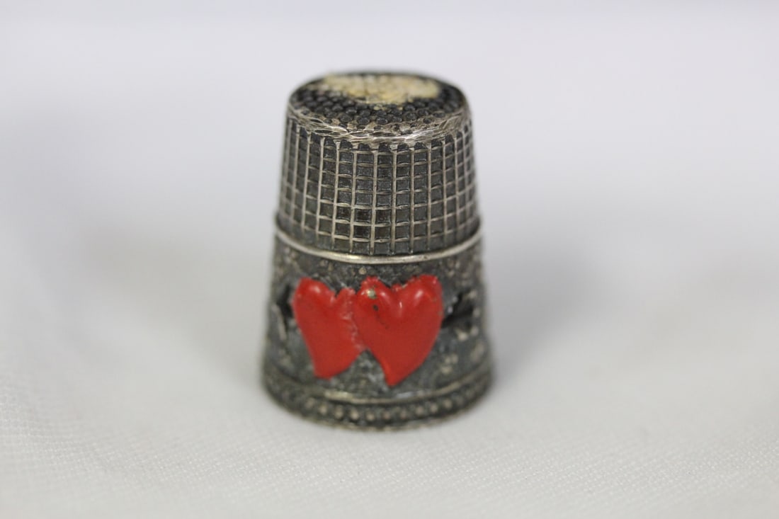 A Stering and Enamel Thimble: as shown