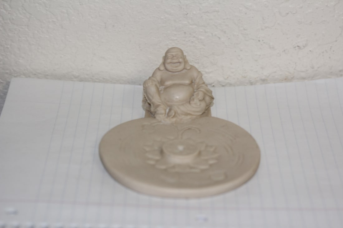 A Buddha Tray: composite material - 5 inches across