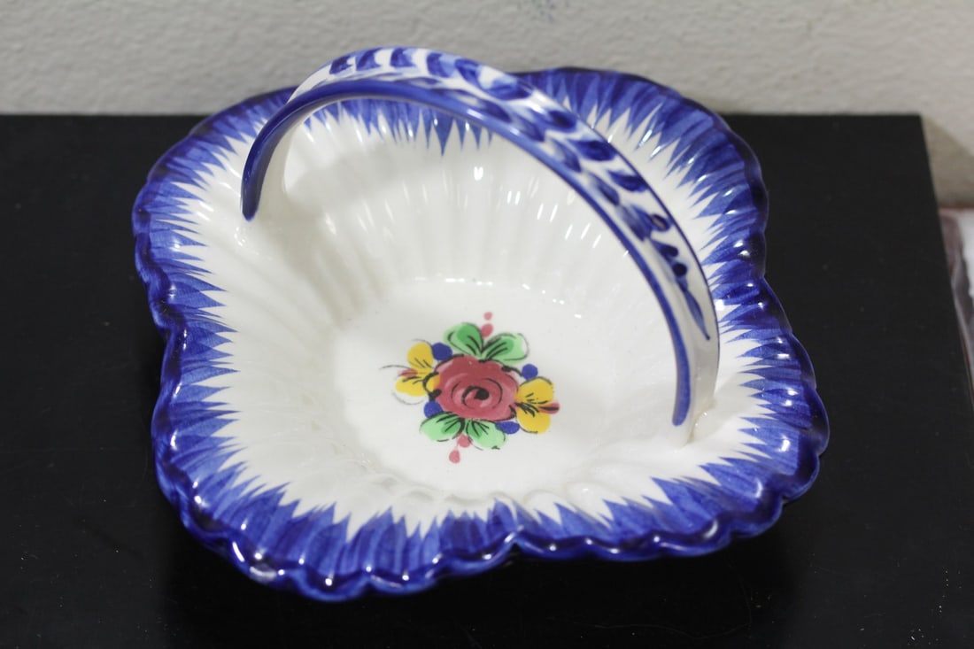 An Alcobach Portugese Ceramic Basket: 7 inches in diameter