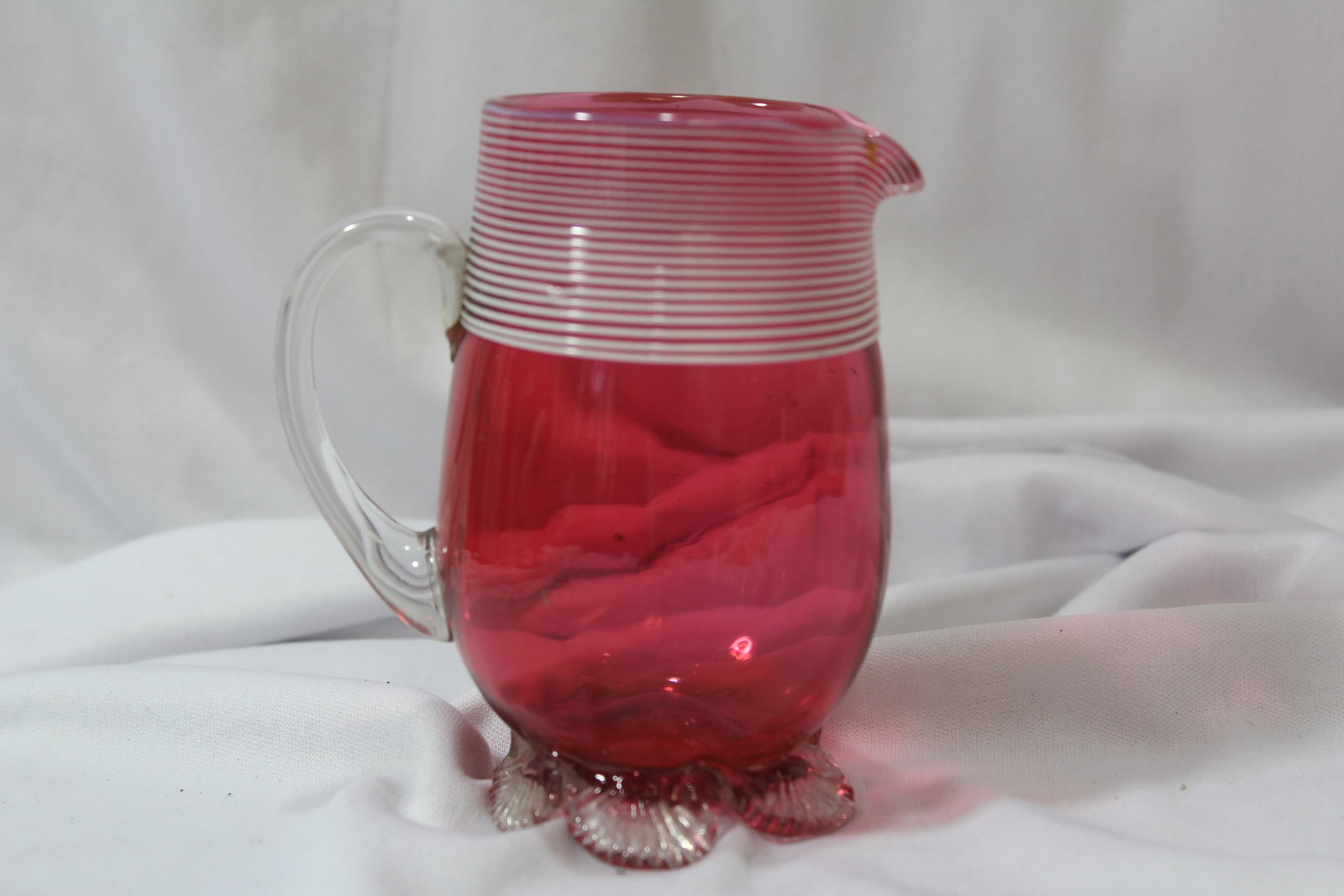 A Cranberry Red Glass Pitcher: 4 1/4" tall