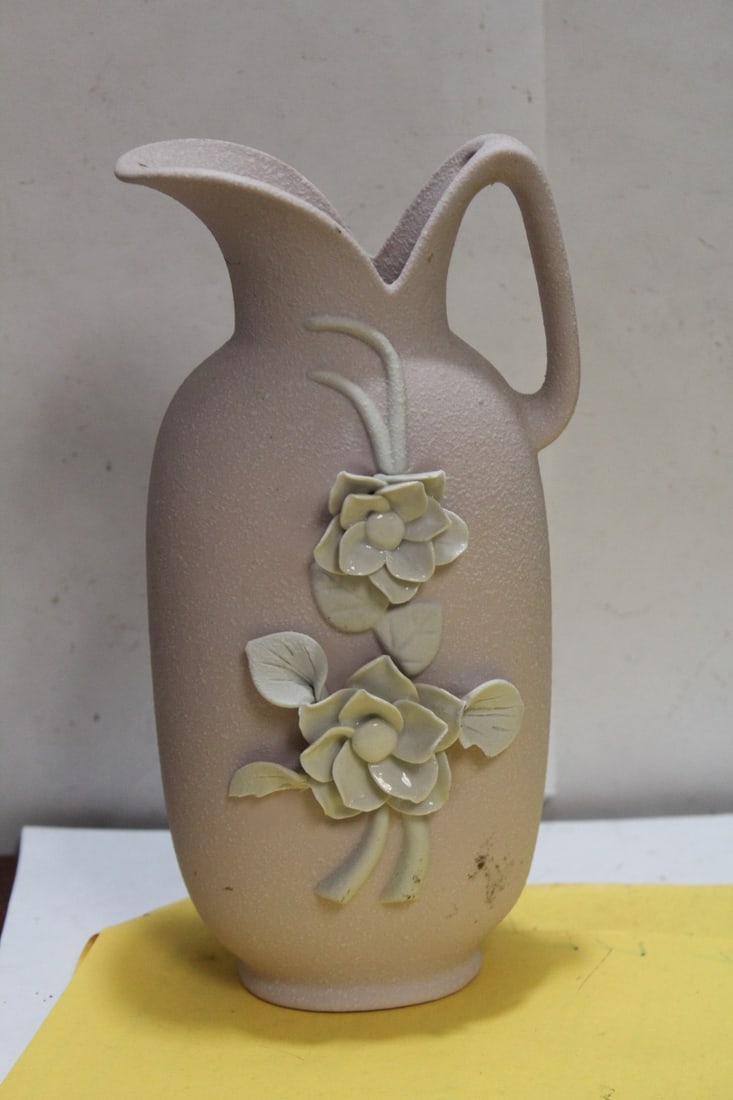 A Ceramic Floral Pitcher: 8 1/8" tall