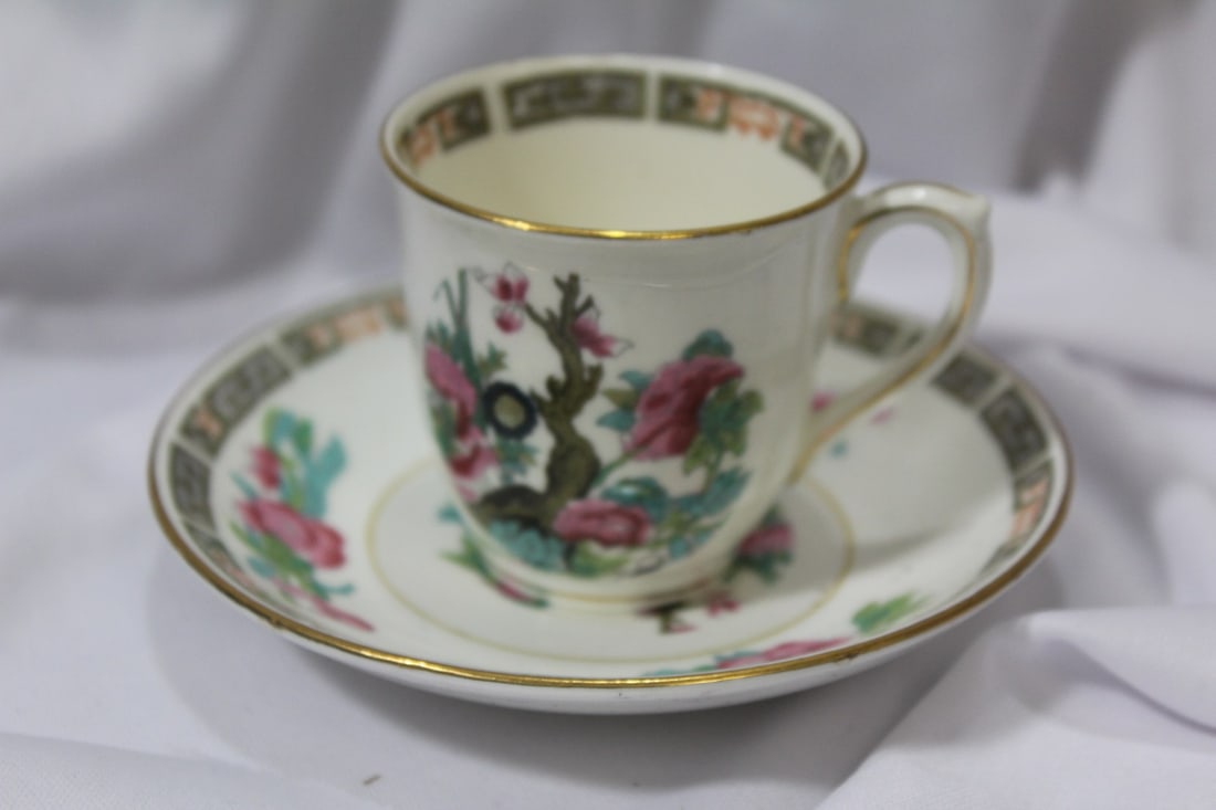 A Ceramic Cup and Saucer: England - cup= 2 3/8" tall