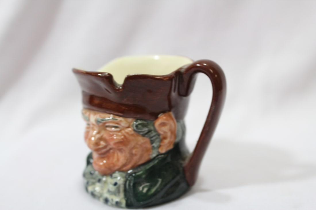 A Royal Doulton Miniature Mug - 6