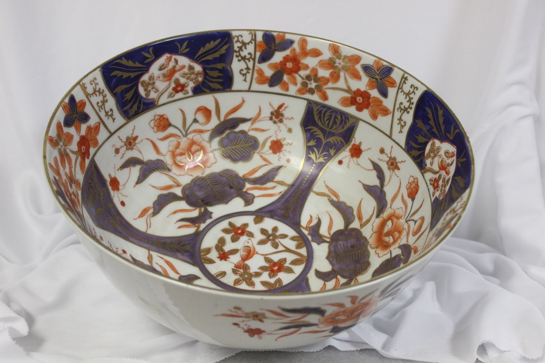 A Large Porcelain Center Bowl: 12 inches in diameter - possibly a gold Imari - 5 1/2" tall