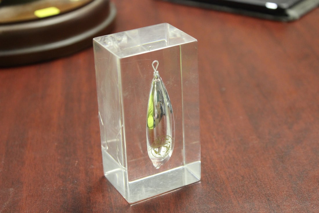 A Lucite Cube: 3 3/4" tall
