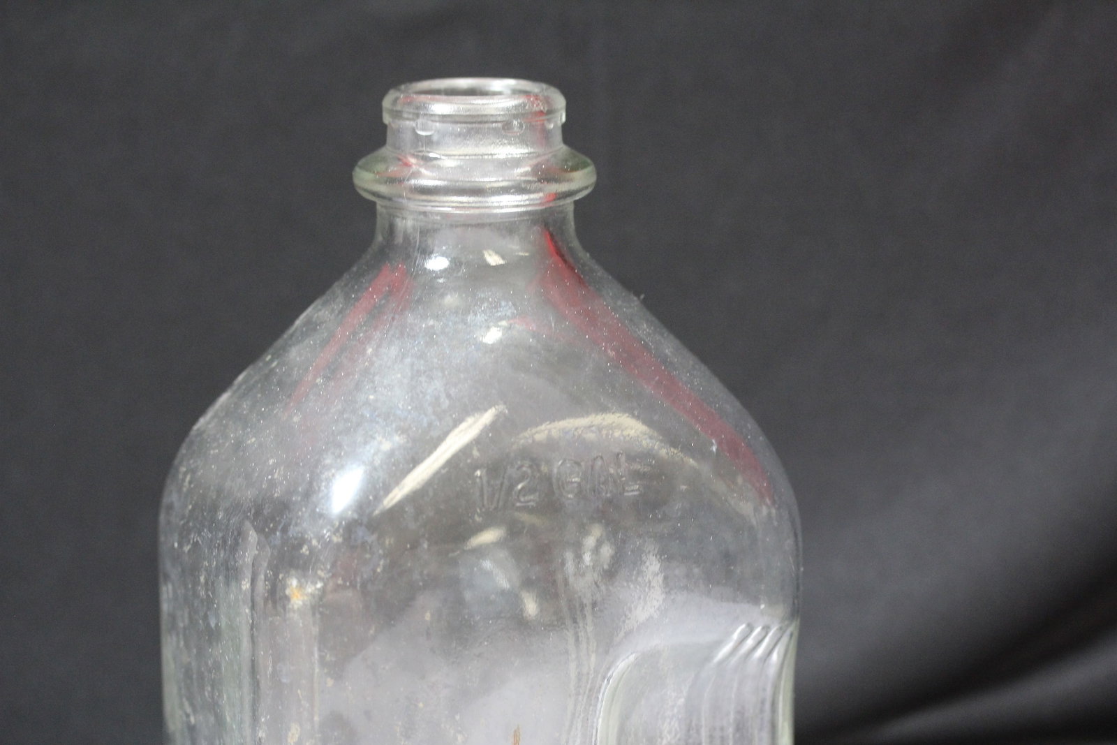 A Vintage Half Gallon Bottle - 8