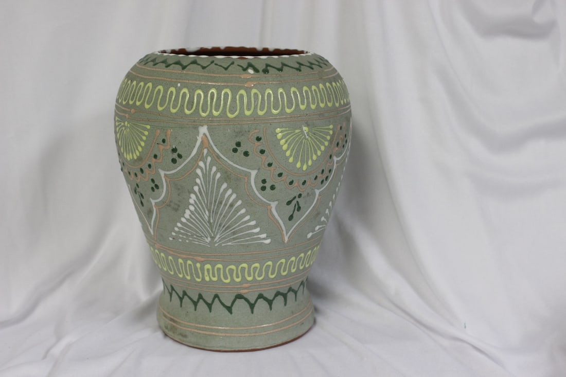 A Ceramic Jar: 8 1/2" tall