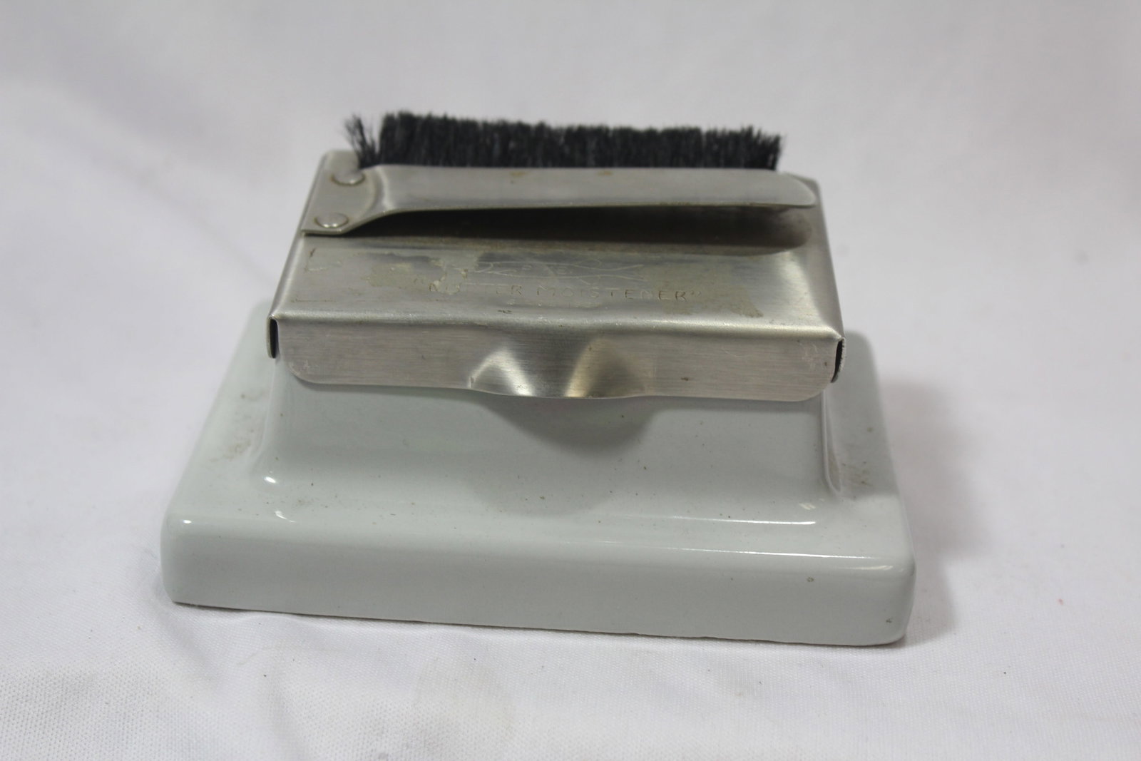 A Vintage Stamp Dispenser Labeler: as shown