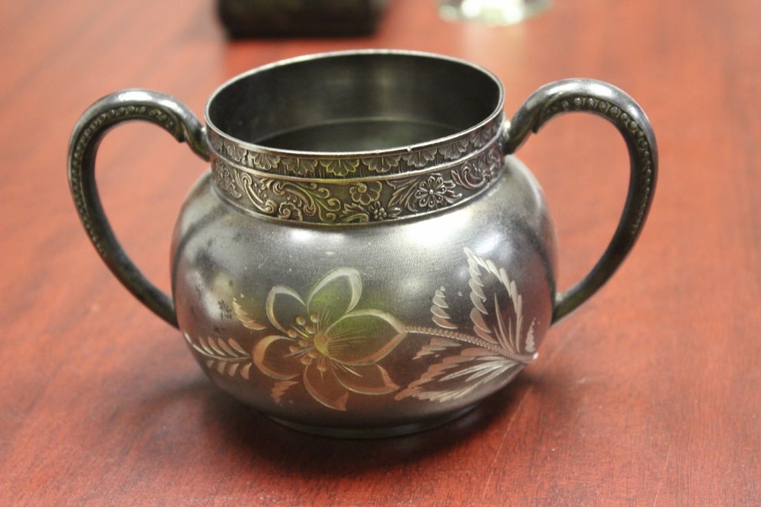 A Metal 2 Handle Cup: 5 1/2" across