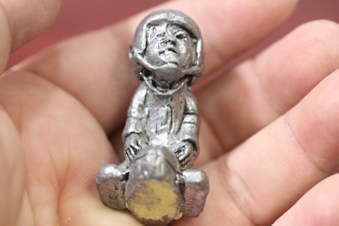 A Small Pewter Football Player - 2