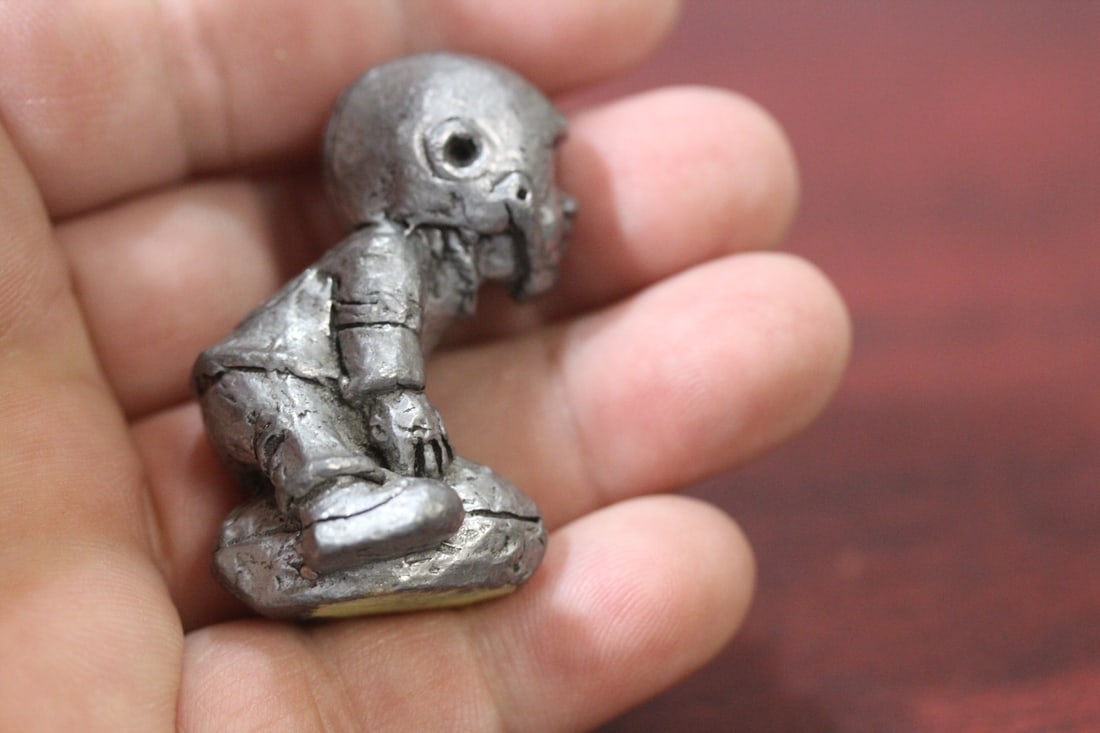 A Small Pewter Football Player - 5