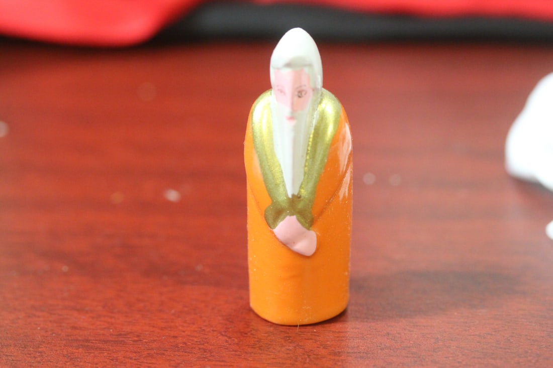 A Wooden Figurine: 3" tall