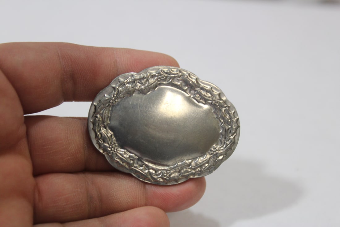 A Kirk Steiff Pewter Pin: 2 1/8" across