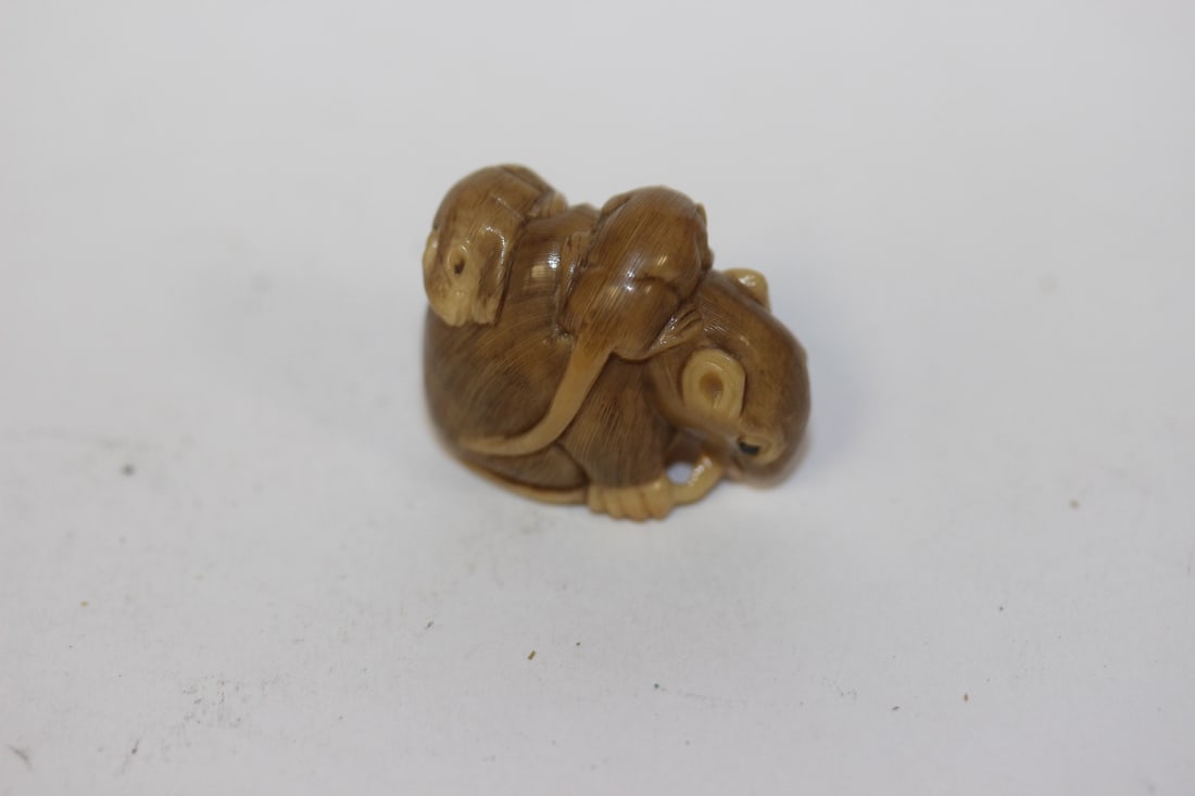 A Finely Carved Japanese Tagua Nut Netsuke - 2